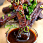 Chinese takeaway style spare ribs dipped into sauce featuring a title overlay.