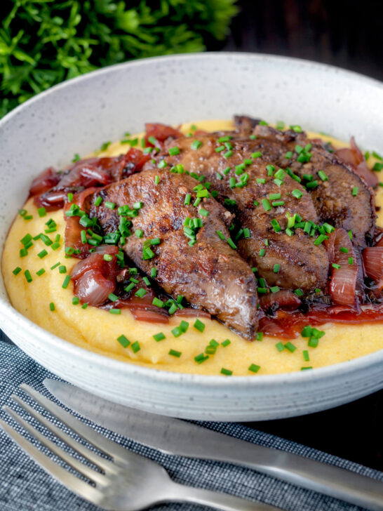 Fried lambs liver and port onions on polenta with chives.