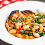 Quick Italian ribollita bean soup from Tuscany with toasted bread.