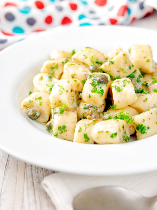 Ricotta cheese gnocchi with caper butter sauce.