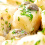 Close-up ricotta cheese gnocchi with caper butter sauce.