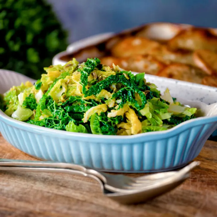 Sauteed buttered savoy cabbage with fennel seeds.