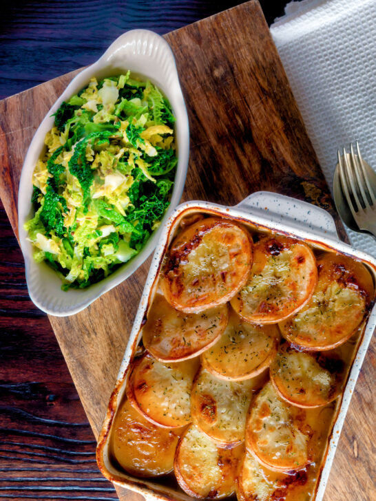 Buttered savoy cabbage with fennel seeds served with Lancashire hotpot.