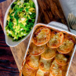 Buttered savoy cabbage with fennel seeds served with Lancashire hotpot featuring a title overlay.