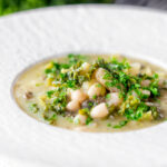 Quick cabbage and white bean soup with potatoes and capers.
