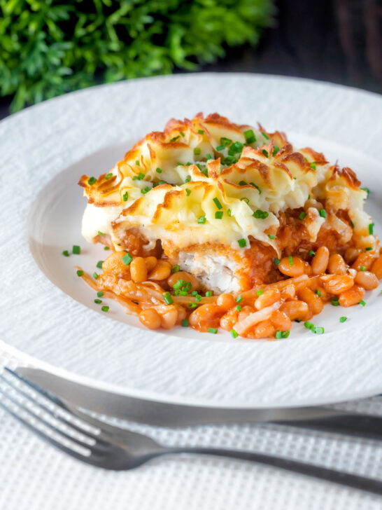 Cheesy mashed potato topped fish finger and baked bean pie.