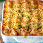 Fish finger and baked bean pie topped with cheesy mash.