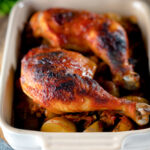 Roasted kimchi chicken leg stew with potatoes and carrots.