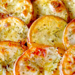 Close-up scalloped potato topping on a traditional British Lamb hotpot.