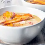 Roasted curried parsnip soup with paprika and crispy fried carrot strips featuring a title overlay.