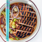 Overhead spicy pork ramen soup.