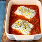 Baked cod with tomato sauce served with green bean amandine featuring a title overlay.