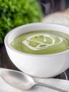 Creamy broccoli and stilton soup with a swirl of cream.