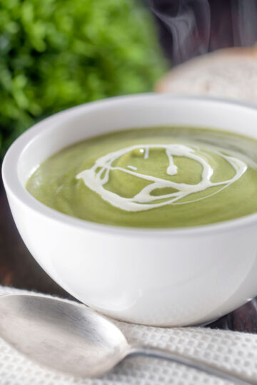 Creamy broccoli and stilton soup with a swirl of cream.