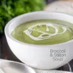 Creamy broccoli and stilton soup with a swirl of cream featuring a title overlay.