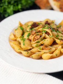 Chicken thigh and chorizo sausage pasta served with garlic bread.