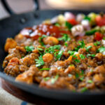 Indian-inspired chickpea and lentil curry with kachumber salad and mango chutney.