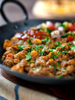 Indian-inspired chickpea and lentil curry with kachumber salad and mango chutney.