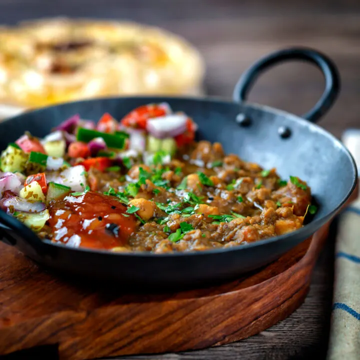 Vegan chickpea and red lentil curry with kachumber salad and mango chutney.