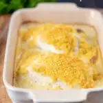 Cod mornay with a breadcrumb topping in a baking dish featuring a title overlay.