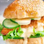 Crispy chicken breast fillet burger with sweet chilli mayo featuring a title overlay.