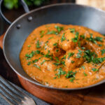 Dum aloo tinned potato curry with a tomato gravy.