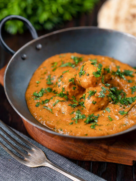 Dum aloo tinned potato curry with a tomato gravy.