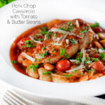 Pork chop casserole with cherry tomatoes and beans served with bread featuring a title overlay.