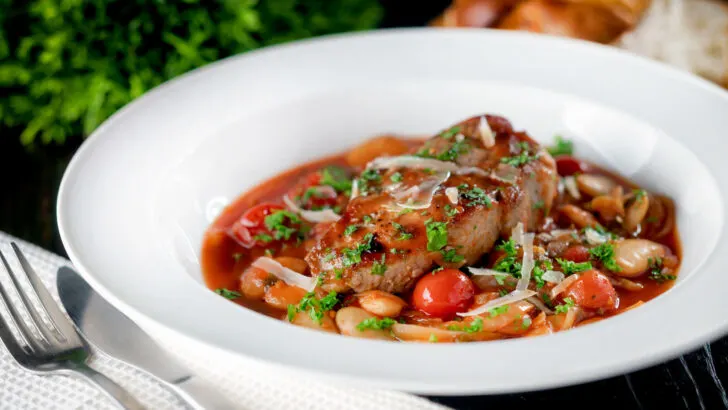 Boneless pork chop casserole with tomatoes and butter beans.