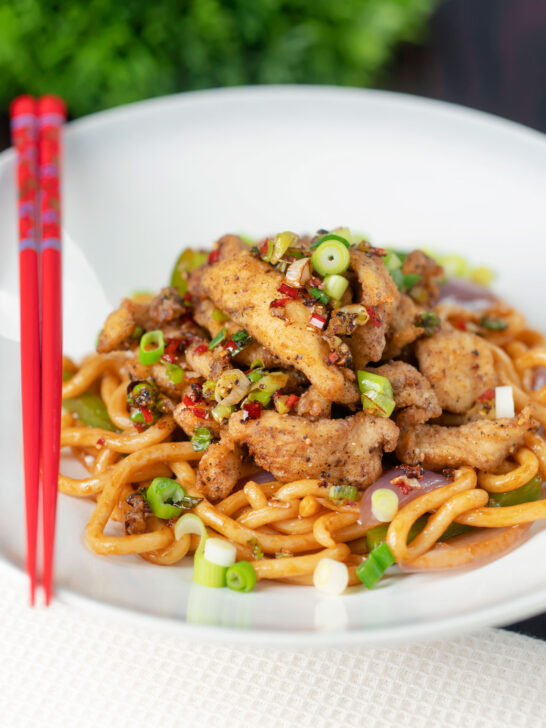 Chinese salt and pepper fried chicken served with udon noodles.