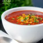 Spicy vegan sweetcorn soup with tomato and chipotle featuring a title overlay.