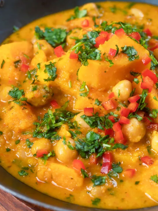 Close-up sweet potato and chickpea curry with coconut milk.