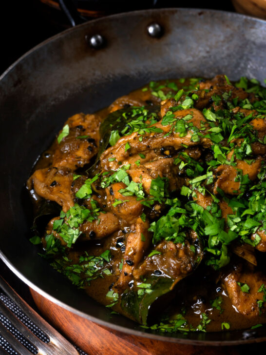 Close-up Tamil black pepper chicken curry, aka Chettinad chicken.