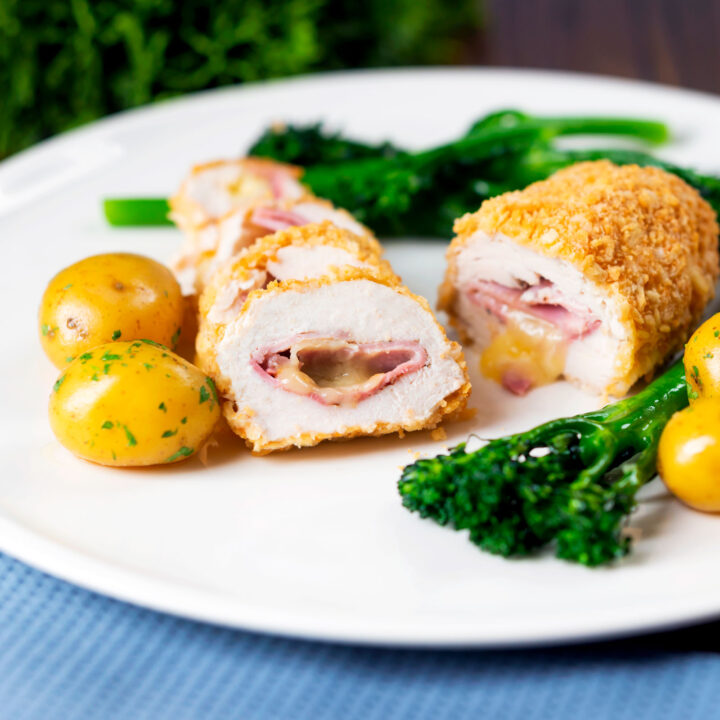 Air fryer chicken cordon bleu served with tenderstem broccoli and parsley potatoes.