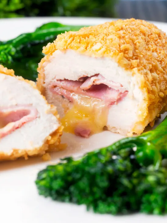 Close-up golden crumbed chicken cordon bleu cooked in an air fryer.