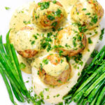 Overhead chicken meatballs with honey, mustard sauce and mashed potato featuring a title overlay.