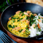 Chicken pasanda yoghurt, coriander and almond curry served with naan bread.