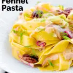 Fennel and orange pasta with red onions and pecan nuts featuring a title overlay.