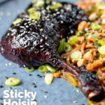 Close-up sticky hoisin baked duck leg with soba noodle salad featuring a title overlay.