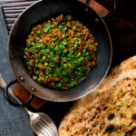 Overhead keema matar, a lamb or mutton mince and pea curry.