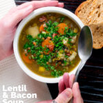 Overhead lentil and bacon soup being eaten with a spoon featuring a title overlay.