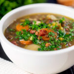 Easy lentil and bacon soup with root veggies and fresh parsley.