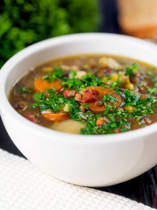 Easy lentil and bacon soup with root veggies and fresh parsley.