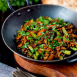 Hot and sour pork mince curry with green beans featuring a title overlay.