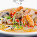 Creamy Thai prawn tom yum soup featuring a title overlay.