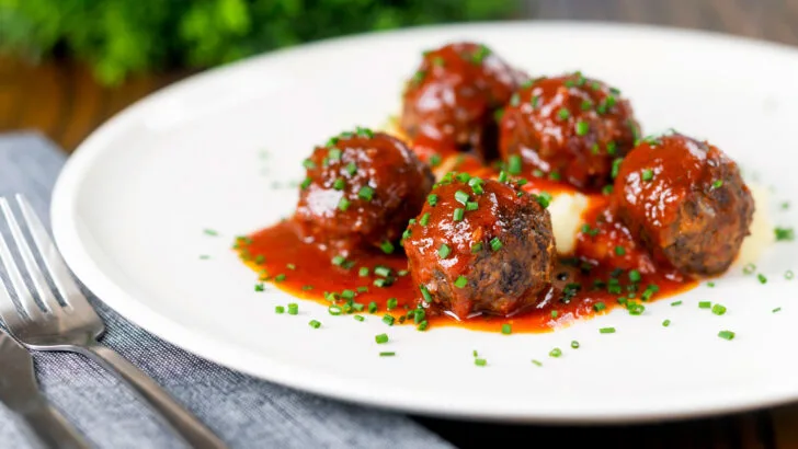 Pork and black pudding meatballs in a beer and tomato sauce served with mashed potato.