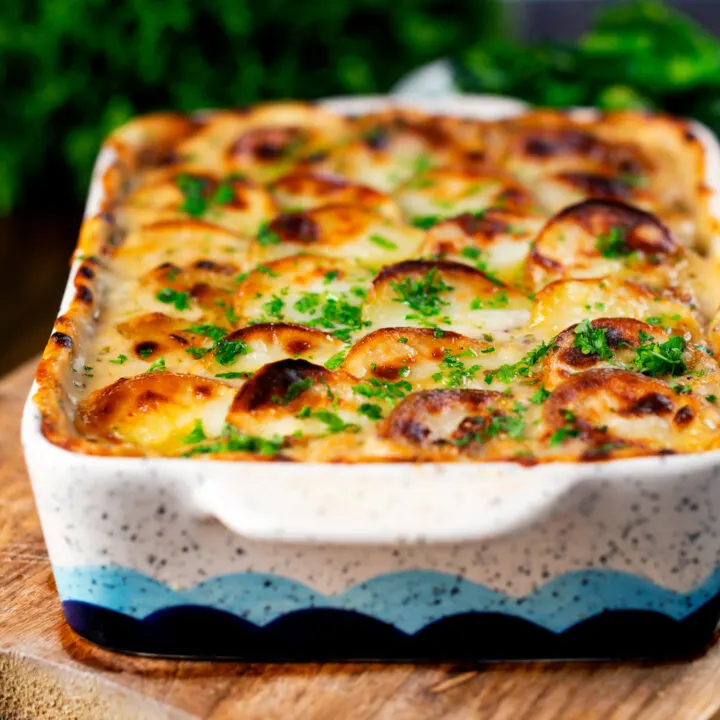 Creamy Chicken and Leek Hotpot with a crispy scalloped potato topping.