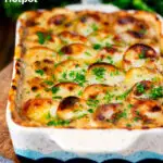 Crispy potato topped oven-baked creamy chicken and leek hotpot featuring a title overlay.