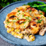 Scalloped potato topped creamy chicken and leek hotpot with roasted tenderstem broccoli.