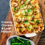 Overhead crispy potato-topped oven-baked creamy chicken and leek hotpot featuring a title overlay.